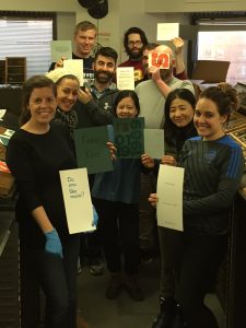 Students show their designs using wood type and metal type from the 1-day Letterpress Workshop in Boston at Mass Art, Spring 2017